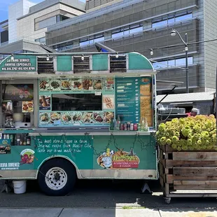a food truck parked in front of a building