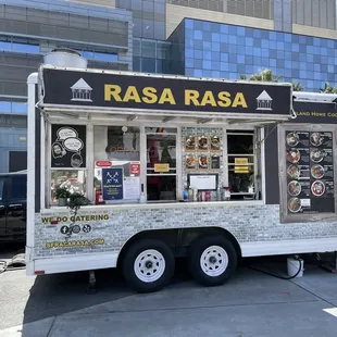 a food truck parked in front of a building