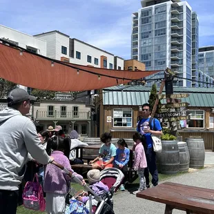 a group of people and a baby stroller