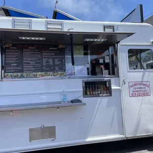 a food truck parked in a parking lot