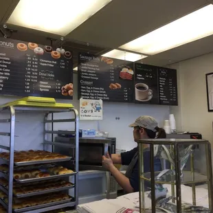 a woman working behind the counter