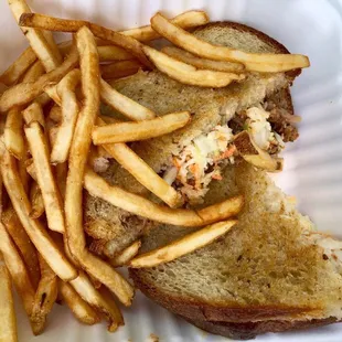 Pitmaster Sando: Smoke Pulled Pork, House made BBQ, and Slaw on House Bread