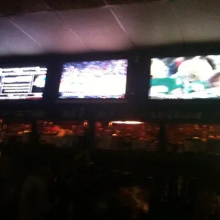 a sports bar with multiple televisions