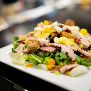 a salad on a white plate
