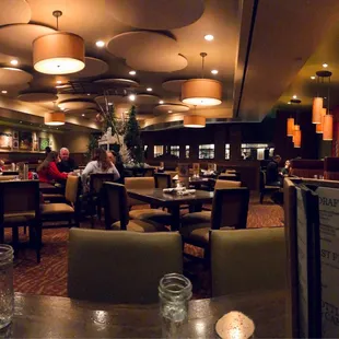 A beautifully-lit, interior space with circular and connective design language