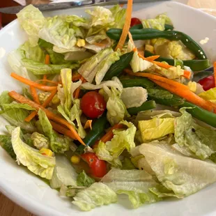 a salad in a white bowl