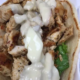 Grilled chicken pita , mayo,lettuce,tomato, Swiss cheese