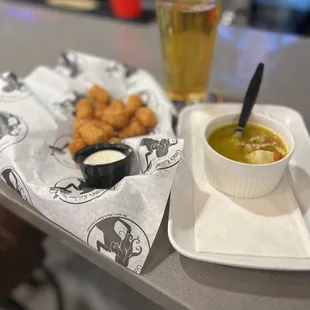 Tater tots and chicken soup made with love from Gina along with beer.