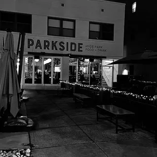 a black and white photo of a restaurant