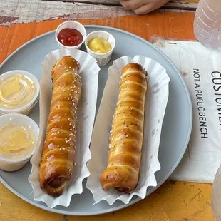 two hot dogs on a plate