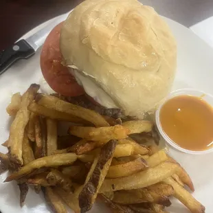 Cheese burger and fries with honey mustard sauce