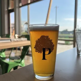 a glass of beer on a table