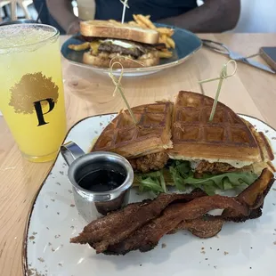 Chicken and waffle sandwich with bacon and peach mason