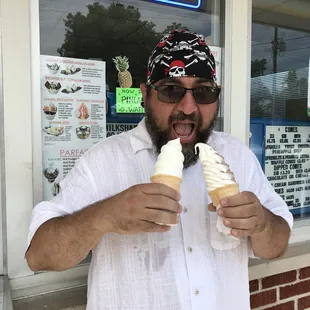 a man eating an ice cream cone