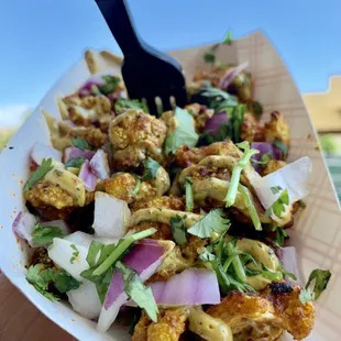 Spicy Cauliflower Bites w/Masala, Red Onions, Mint Sauce and Fresh Cilantro!