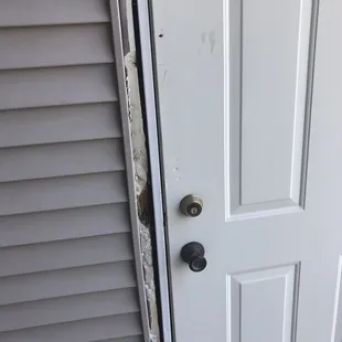 A damaged maintenance door, as you can tell they do a wonderful job keeping this place looking nice
