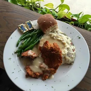 Country Fried Chicken with Homage Gravy, Garlic Mashed Potatoes and Green Beans.