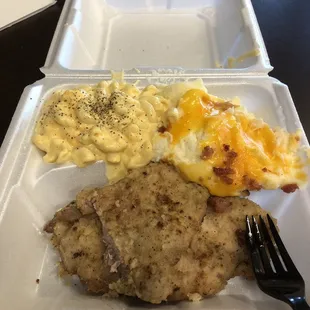 Two pieces of fried pork loin, cheesy &amp; baconny mashed potatoes, and mac &amp; cheese - all for $4.99