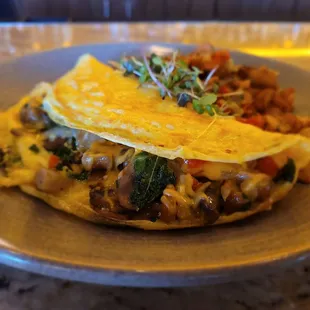 Juniper Omelet
Three eggs, mushrooms, sausage, peppers, onions, Cheddar cheese, kale, breakfast potatoes