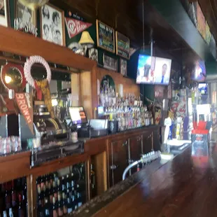 a bar with a lot of bottles