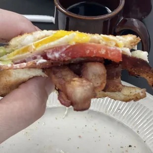 Last two bites of my favorite HOMETOWN resteraunt BLT with egg!
