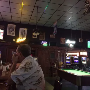 Large barroom with pool table.