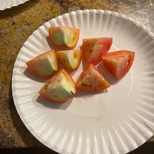 a plate of sliced apples