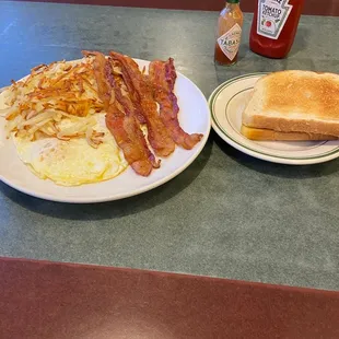 Fried eggs, hash browns and bacon. Very good.