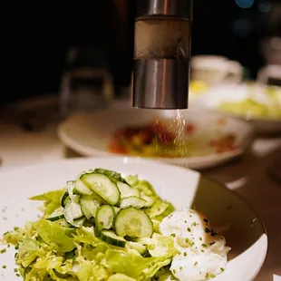 a plate of food being prepared