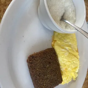 an omelet and a slice of bread