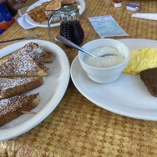 two plates of breakfast food