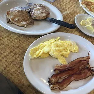 Pork chop and eggs breakfast without hash browns and a side of bacon