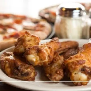 a plate of chicken wings