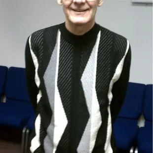 a man in a black and white sweater