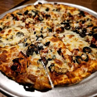This one has lots of olives and and mushrooms on it