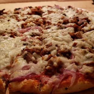 12&quot; w/vegan cheese, vegan sausage &amp; vegan pepperoni ($26.19). Decent, but not amazing. Cheese has no flavor &amp; is excessive.