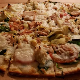14&quot; &quot;Artichicken&quot; pizza ($27), vegan by default. Lacks flavor w/o any sauce. Cheese was creamy/mushy &amp; adds no joy. Not sure of brand.