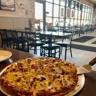 BBQ chicken pizza with added banana peppers. Totally recommend!