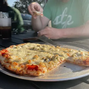 Pepperoni and green olives pizza