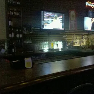 At the bar.