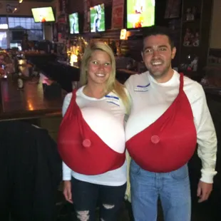 a man and woman dressed in costumes