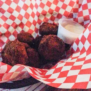 Fried mushrooms. Dark in color but really good.