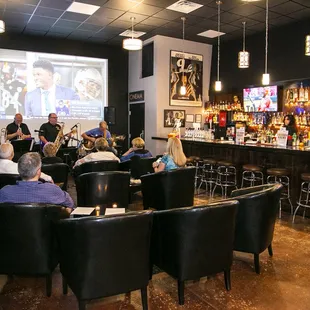 people sitting at the bar