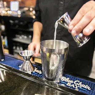 bartender pouring a drink