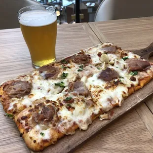 Prosciutto flatbread with a cold Sweetwater IPA to wash it down.