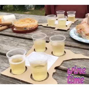 a picnic table full of food and drinks