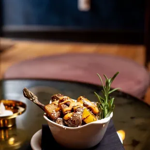 Chicken and Rosemary Petite Potato bowl. Small bites crafted to pair with signature cocktails. Kitchen open til midnight.