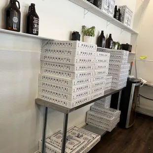 a shelf of boxes of doughnuts