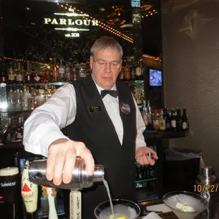 bartender pouring a drink