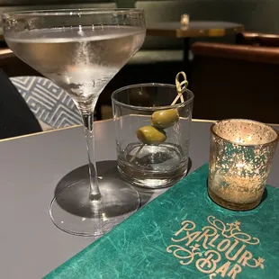 a martini and a glass of water